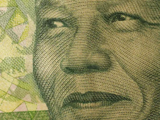 A stylised close-up photograph of Wolsey Hall Oxford alumnus Nelson Mandela, former President of South Africa.