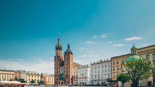 Historic square in Kraków, Poland, with St Mary’s Basilica and surrounding architecture