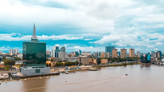 Modern skyline of Lagos with Civic Centre Tower and waterfront views under a blue sky