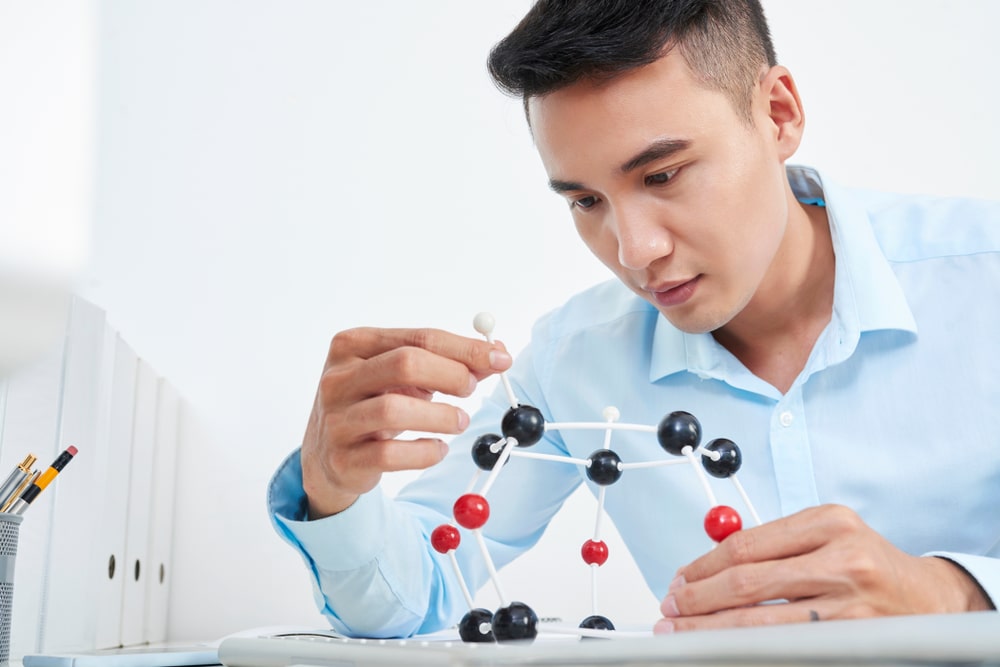 IGCSE Chemistry student looking at a molecule
