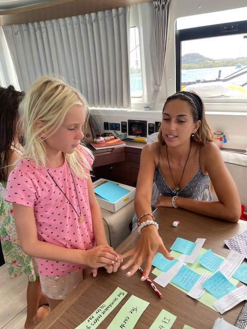 Lisa homeschooling at sea